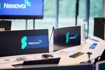 close-up view of screens in the Nexova training room with the Nexova logo on them