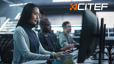 Photo of woman sitting typing in front of screen with CITEF logo at top right